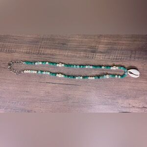 Handmade adjustable seashell necklace with pearls and green beads